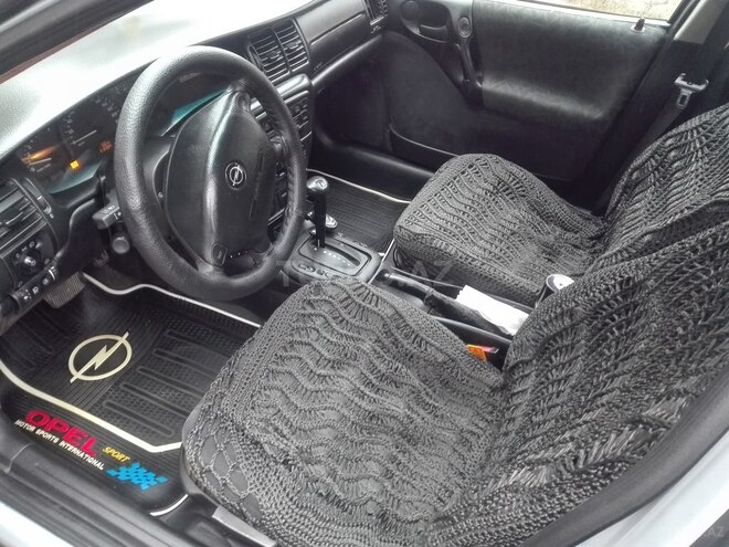 Opel Vectra 1999, 310,000 km - 1.8 л - Quba