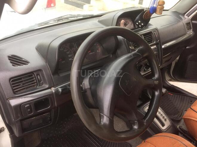 Mitsubishi Pajero io 1999, 220,000 km - 1.8 l - Bakı