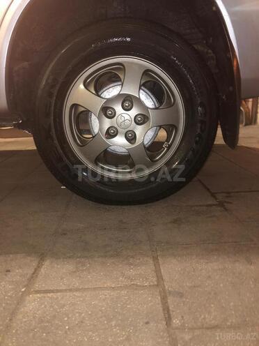 Mitsubishi Pajero io 2003, 246,000 km - 2.0 l - Bakı
