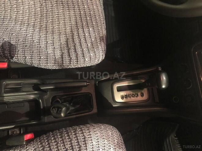 Mitsubishi Pajero io 2003, 246,000 km - 2.0 l - Bakı