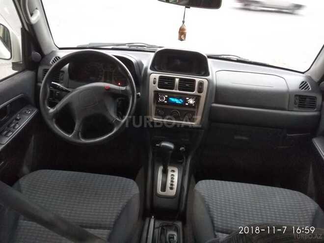 Mitsubishi Pajero io 1999, 252,000 km - 1.8 l - Bakı