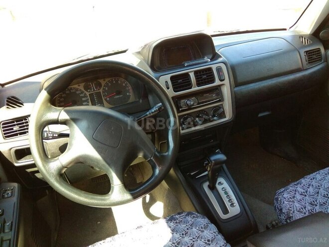 Mitsubishi Pajero io 1999, 250,000 km - 1.8 l - Bakı