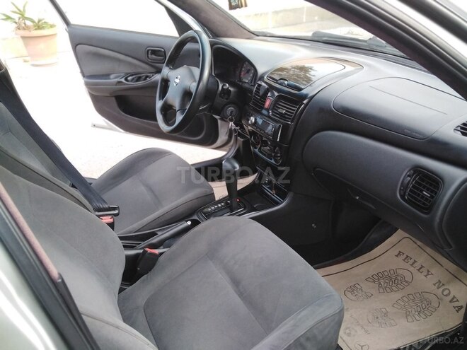 Nissan Sunny 2004, 304,000 km - 1.6 l - Bakı