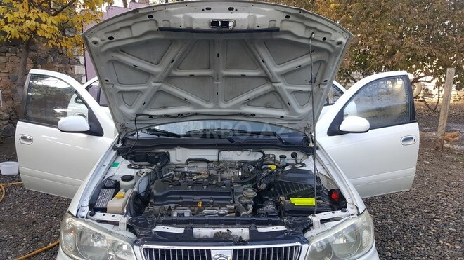 Nissan Sunny 2004, 322,417 km - 1.6 л - Qazax