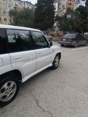 Mitsubishi Pajero io 1999, 233,100 km - 1.8 l - Bakı