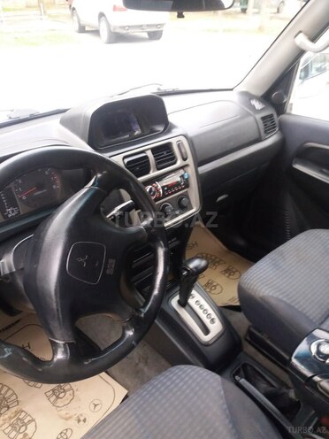 Mitsubishi Pajero io 1999, 233,100 km - 1.8 l - Bakı