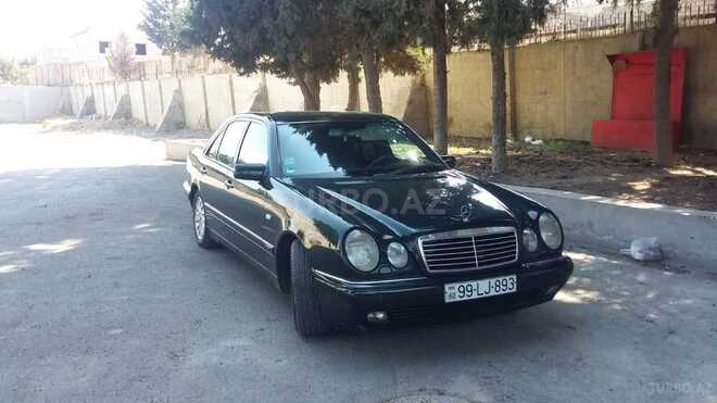 Mercedes E 230 1997, 300,615 km - 2.3 l - Bakı