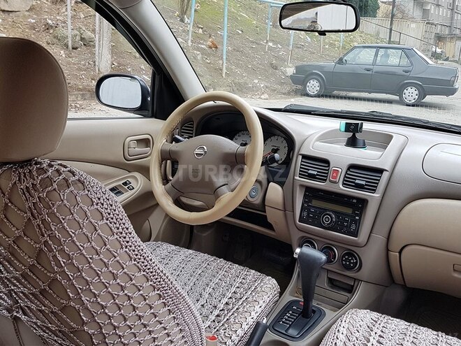 Nissan Sunny 2009, 182,000 km - 1.6 л - Bakı