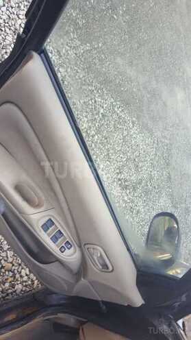 Nissan Sunny 2006, 450,000 km - 1.3 l - Bakı