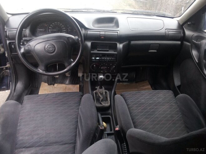 Opel Astra 1997, 200,000 km - 1.6 л - Qusar