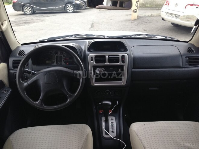 Mitsubishi Pajero io 2004, 186,492 km - 2.0 l - Bakı