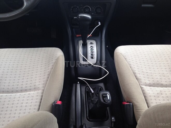 Mitsubishi Pajero io 2004, 186,492 km - 2.0 l - Bakı