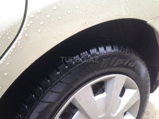 Nissan Tiida 2006, 250,000 km - 1.6 л - Bakı