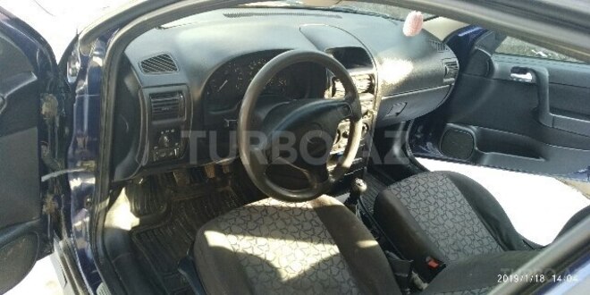 Opel Astra 1999, 250,000 km - 1.6 l - Qusar