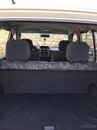 Mitsubishi Pajero io 1999, 223,652 km - 1.8 l - Bakı