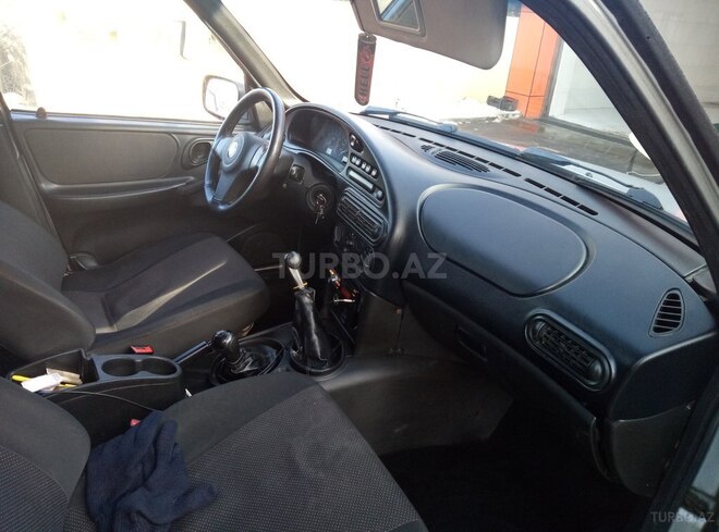 Chevrolet Niva 2012, 90,000 km - 1.7 л - Quba
