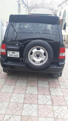 Mitsubishi Pajero io 2003, 136,200 km - 2.0 l - Bakı