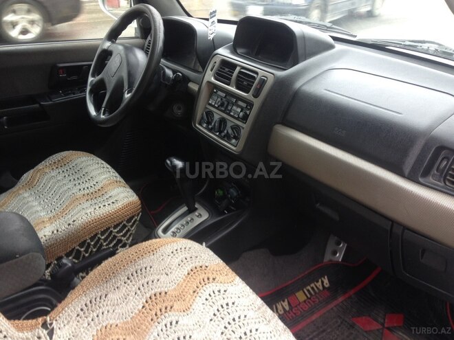 Mitsubishi Pajero io 1999, 320,000 km - 1.8 l - Bakı