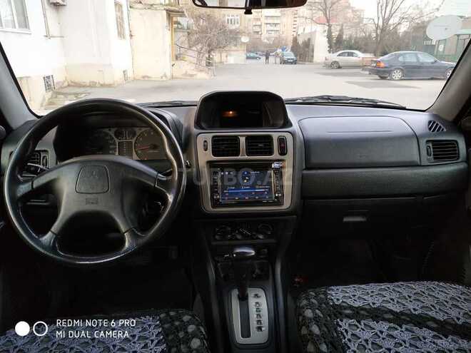 Mitsubishi Pajero io 1999, 322,107 km - 1.8 l - Bakı