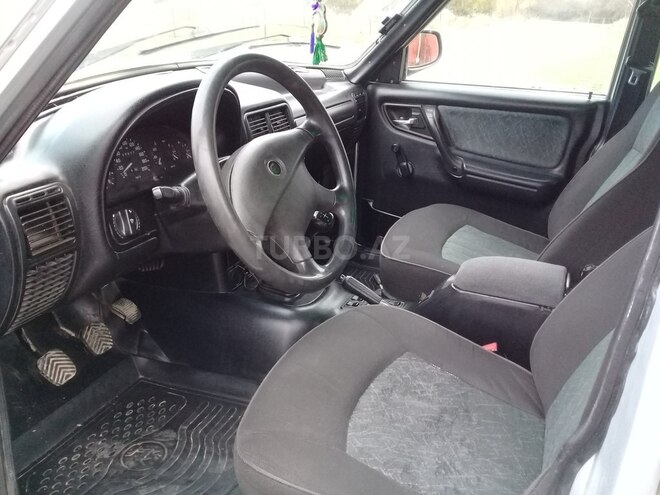 GAZ 31105 2005, 158,274 km - 2.4 l - Quba