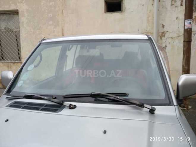 Mitsubishi Pajero io 1999, 295,000 km - 1.8 l - Bakı