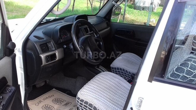 Mitsubishi Pajero io 1999, 265,000 km - 1.8 л - Bakı