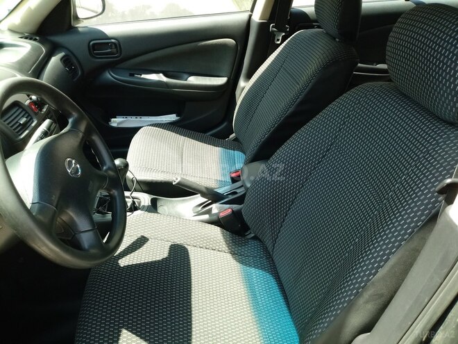 Nissan Sunny 2009, 295,000 km - 1.3 l - Bakı