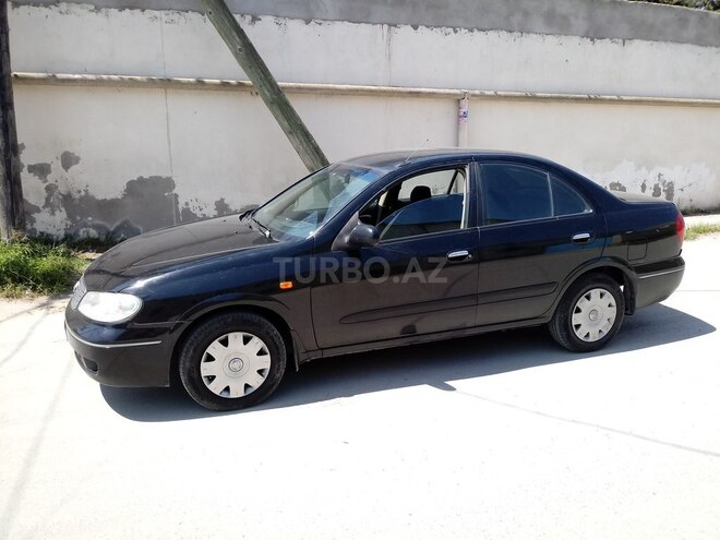 Nissan Sunny 2009, 295,000 km - 1.3 l - Bakı