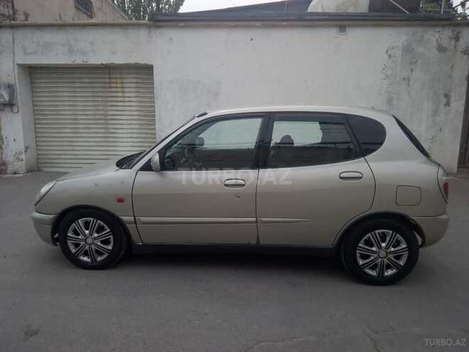 Nissan March 1999, 132,000 km - 1.0 л - Bakı