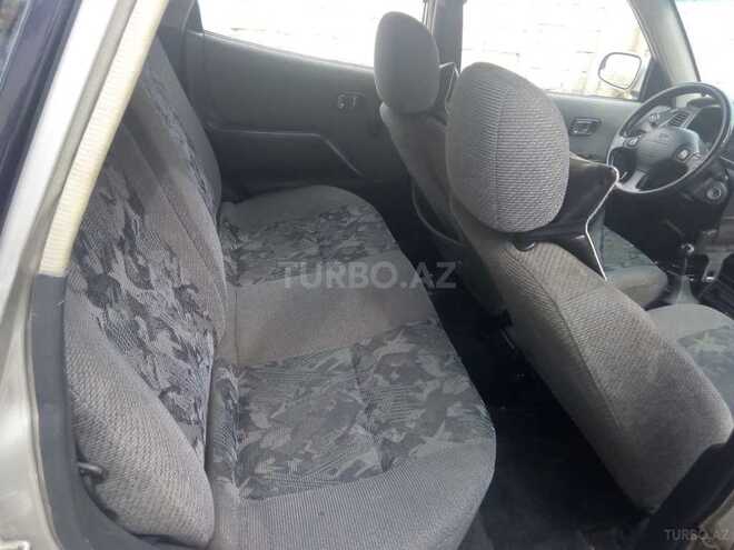 Nissan March 1999, 132,000 km - 1.0 л - Bakı