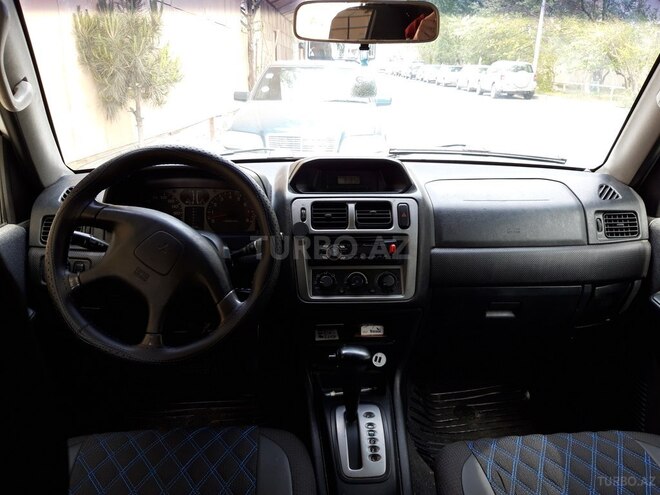 Mitsubishi Pajero io 2001, 250,000 km - 0.2 l - Bakı
