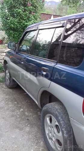 Mitsubishi Pajero io 1999, 261,174 km - 1.8 l - Bakı