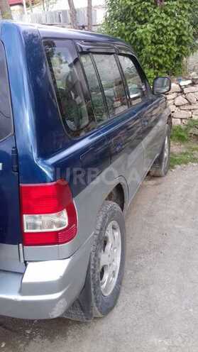 Mitsubishi Pajero io 1999, 261,174 km - 1.8 l - Bakı