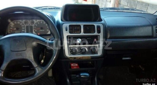 Mitsubishi Pajero io 2002, 250,000 km - 2.0 l - Beyləqan