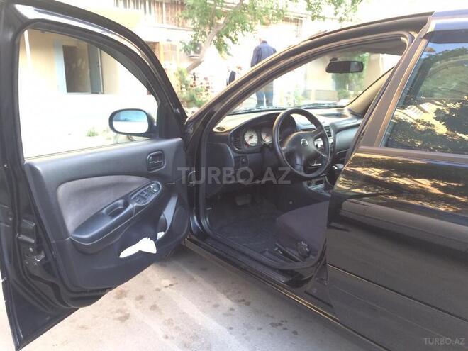Nissan Sunny 2006, 245,000 km - 1.3 l - Bakı