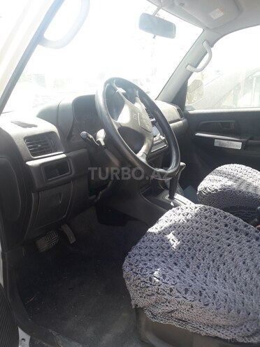 Mitsubishi Pajero io 2001, 246,000 km - 2.0 l - Bakı
