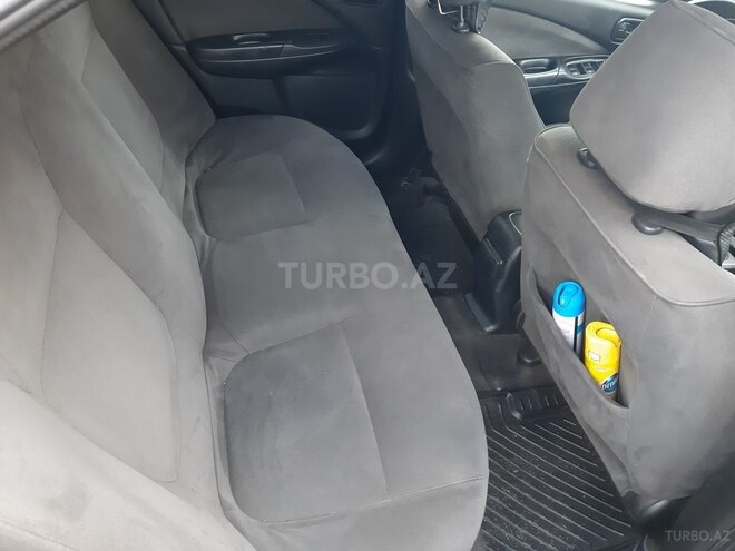 Nissan Sunny 2006, 166,002 km - 1.3 l - Bakı