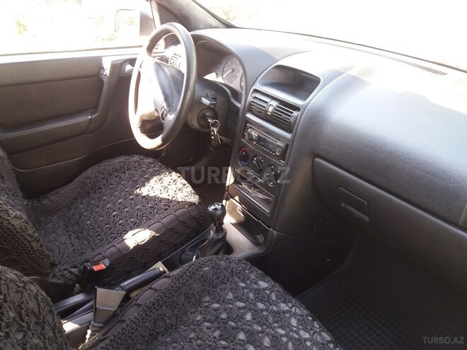 Opel Astra 1999, 387,000 km - 1.6 l - Qax
