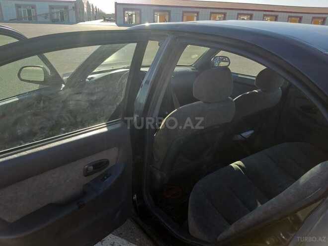 Hyundai Elantra 2002, 250,000 km - 2.0 l - Bakı