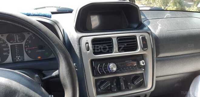 Mitsubishi Pajero io 1999, 199,999 km - 1.8 л - Bakı