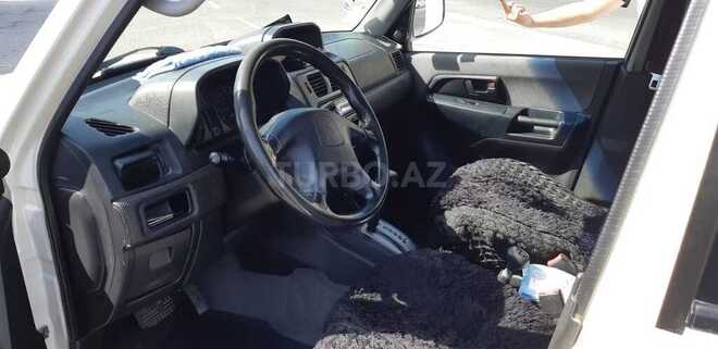 Mitsubishi Pajero io 1999, 199,999 km - 1.8 л - Bakı