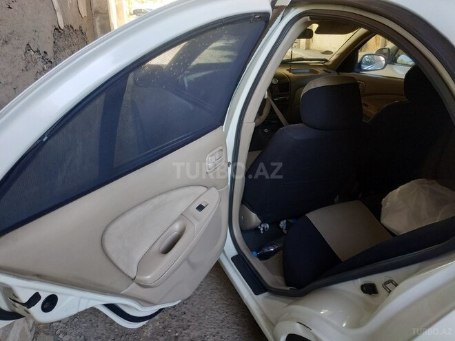 Nissan Sunny 2006, 240,000 km - 1.3 l - Bakı