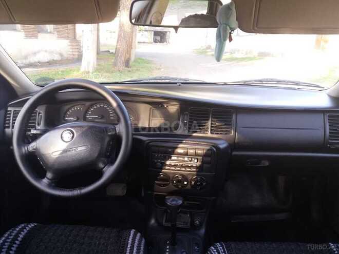 Opel Vectra 1999, 247,000 km - 1.8 l - Qax