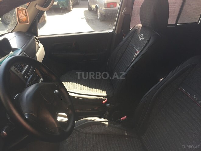 Mitsubishi Pajero io 1999, 245,000 km - 1.8 l - Xırdalan