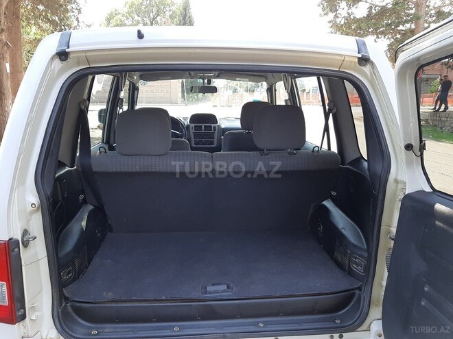 Mitsubishi Pajero io 1999, 230,000 km - 1.8 л - Samux