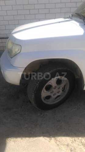Mitsubishi Pajero io 1999, 100,000 km - 1.8 l - Bakı