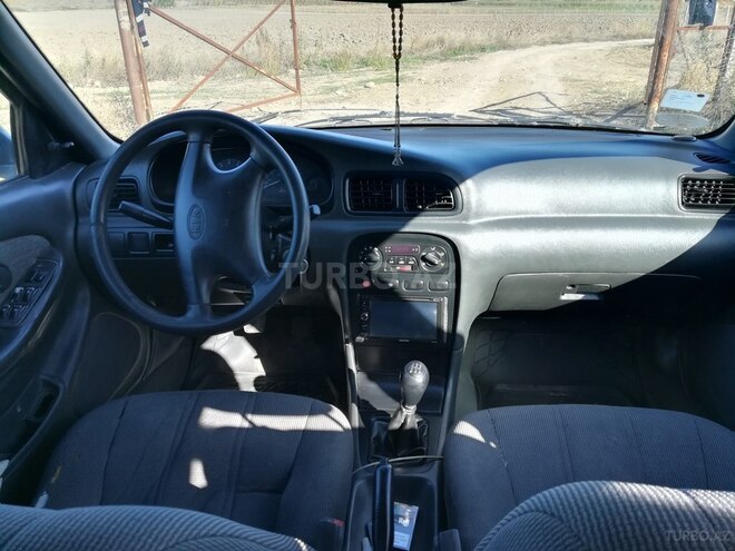 Kia Clarus 1997, 303,140 km - 2.0 л - Quba