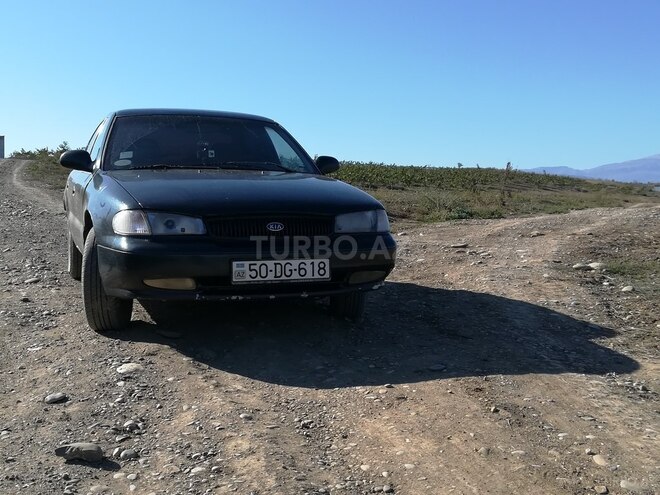 Kia Clarus 1997, 303,140 km - 2.0 л - Quba