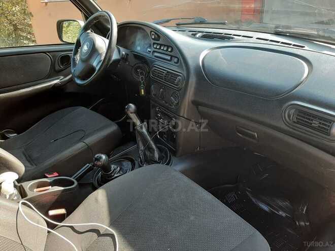 Chevrolet Niva 2012, 200,588 km - 1.7 l - Quba