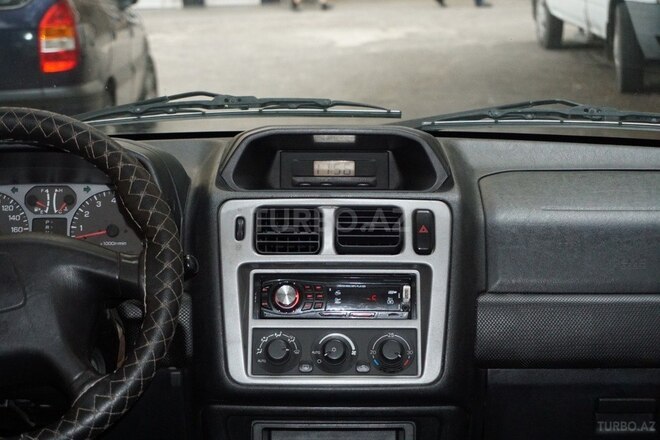 Mitsubishi Pajero io 2001, 256,950 km - 2.0 л - Bakı